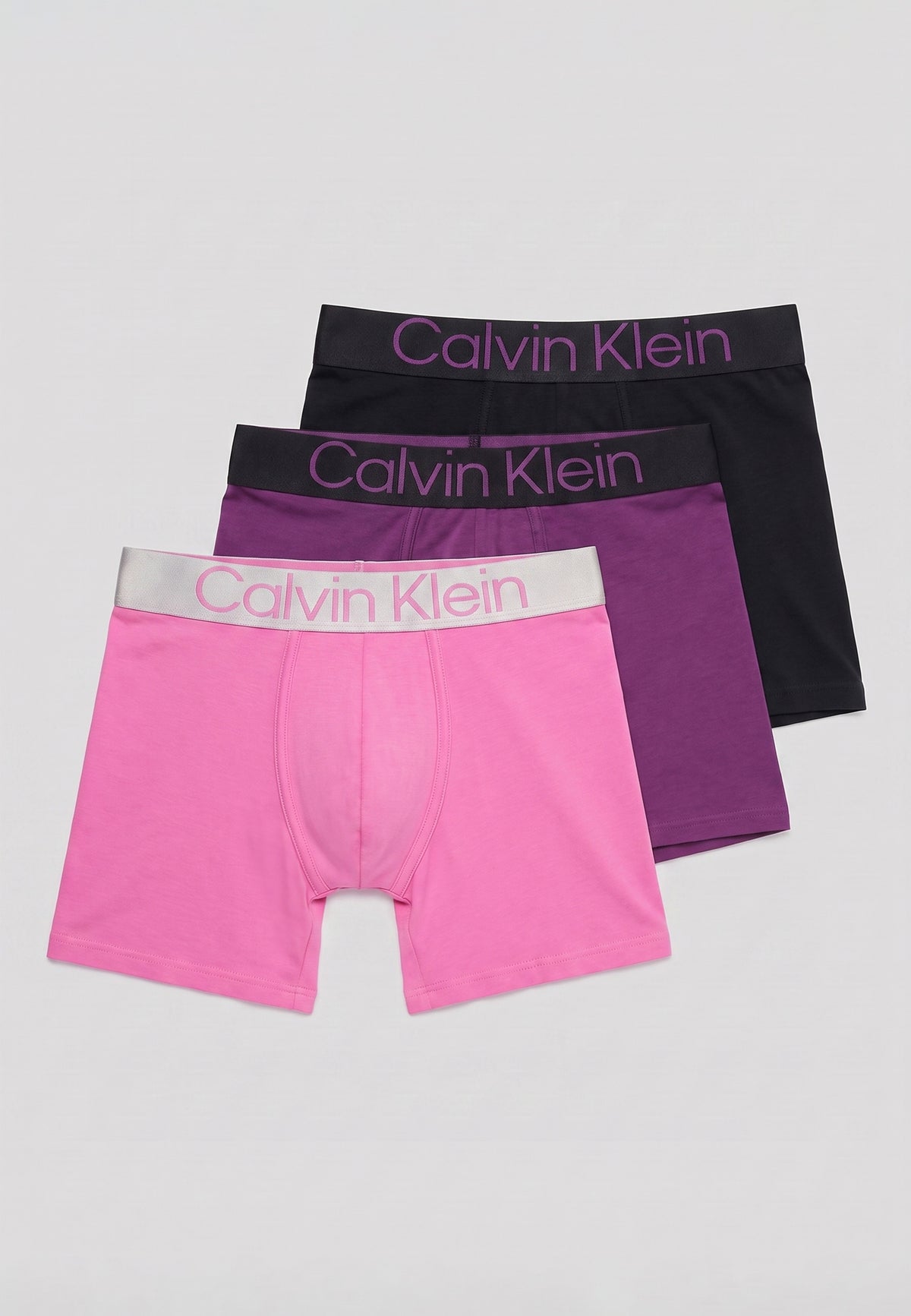 Pack de 3 boxers longs Calvin Klein — exemple d'assortiment : rose, violet et noir