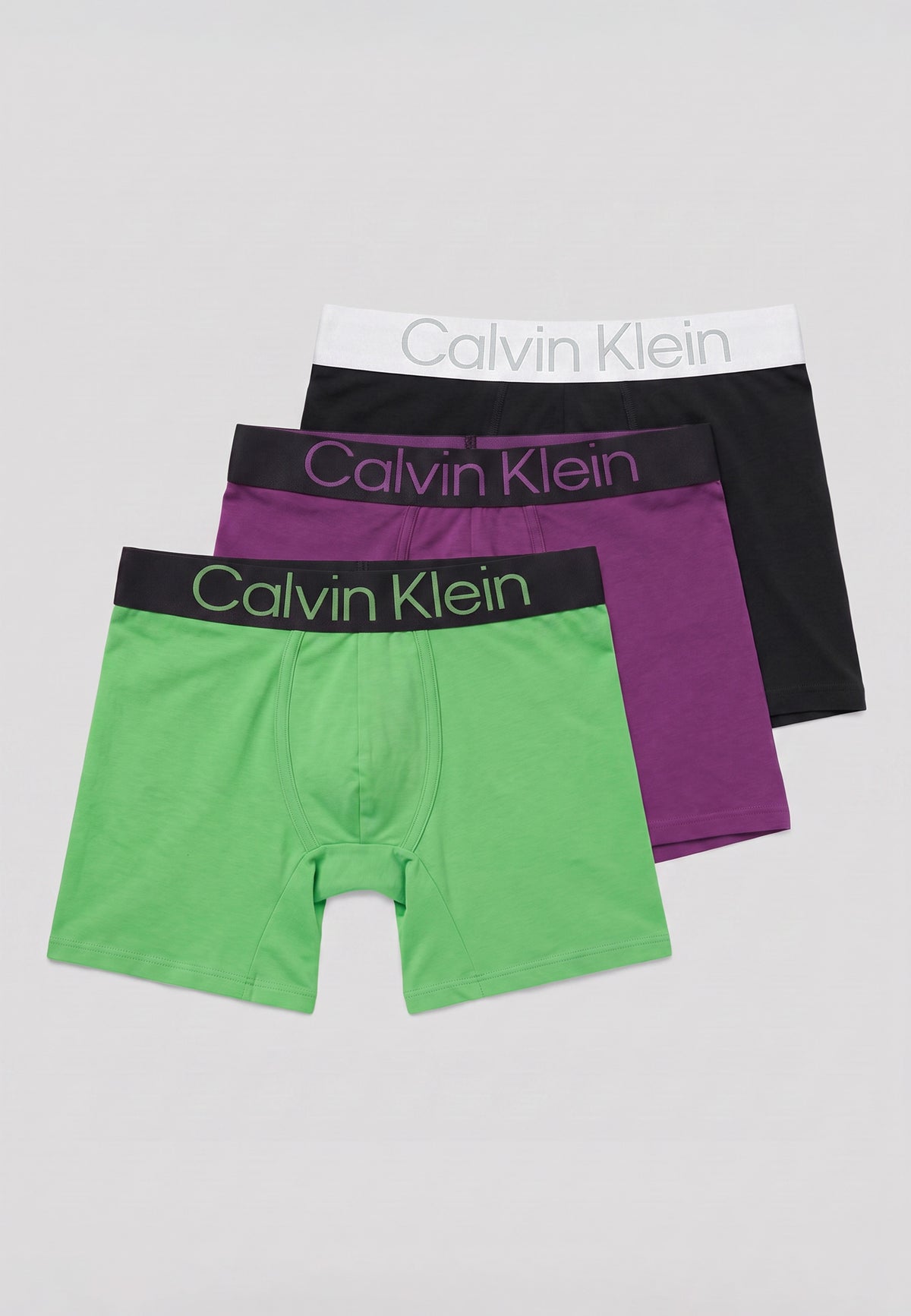 Pack de 3 boxers longs Calvin Klein — exemple d'assortiment : vert, violet et noir